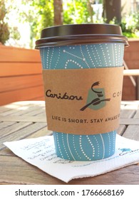 Ankara, Turkey/June 2020: Caribou Coffee Company is an American coffee company and coffeehouse chain. founded in Edina, Minnesota, in 1992. Their motto is "Life is short. Stay awake for it."