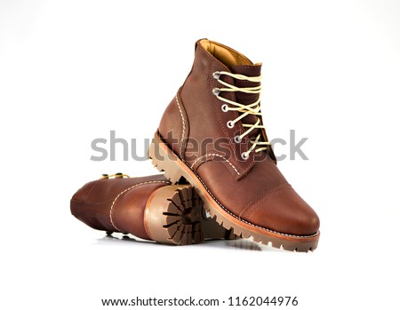 Men’s ankle boot with nubuck leather isolated on white background, closed up