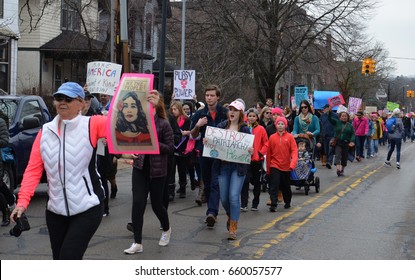 ANN ARBOR, MI - JAN 21:  Protesters march toward the University of Michigan campus at the Women's March in Ann Arbor on January 21, 2017. 