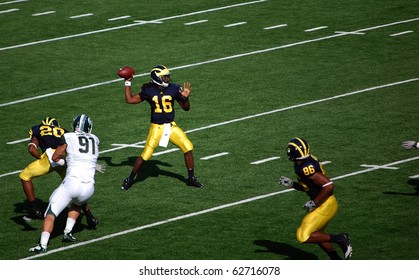 ANN ARBOR, MI - OCTOBER 09: Denard Robinson Throws A Pass During The Michigan Vs. Michigan State Football Game October 9, 2010 In Ann Arbor, MI. Michigan Lost The Game 34-17.