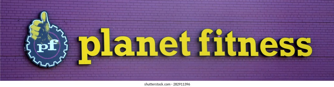ANN ARBOR, MI - SEPTEMBER 7:  Planet Fitness, whose west Ann Arbor, MI location logo is shown on September 7, 2014, has over 900 locations. 
