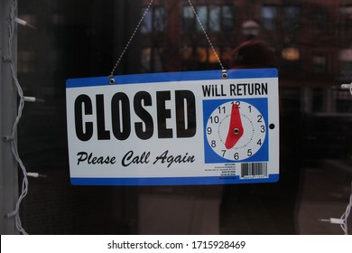 Ann Arbor, Michigan / United States - April 26 2020: Sorry We're Closed Wooden Closing Sign Covid- Governor Gretchen Whitmer Extends Stay At Home Order Michigan Coronavirus Closed Sign