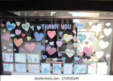 Ann Arbor, Michigan / United States - April 26 2020: Thank You Healthcare Workers Hearts Message Artwork Sign In Window Downtown Coronavirus Quarantine Governor Whitmer Extends Stay At Home Order