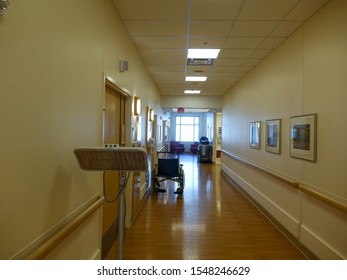 Ann Arbor, Michigan/ USA - May 2018:  Hospital Hallway With A Parked Wheelchair. 
