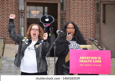 ANN ARBOR, MI/USA - MAY 21, 2019: Cassy Jones McBryde, founder of the International Fuller Woman Network, addresses the Ann Arbor Stop the Bans protest organized by Planned Parenthood. 