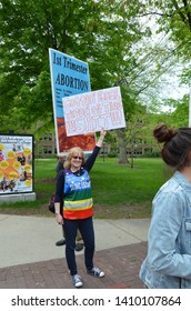 ANN ARBOR, MI/USA - MAY 21, 2019: Protester displays a sign before the Ann Arbor Stop the Bans protest organized by Planned Parenthood. 