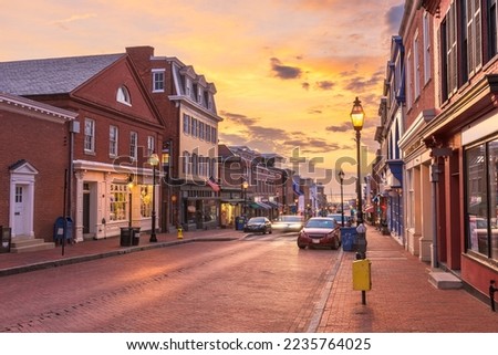Annapolis, Maryland, USA downtown cityscape on Main Street at dawn.