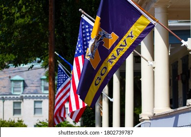 Annapolis, MD 08/21/2020: American Flags And Navy Football Team Flags Are Flying On Post On A Sunny Day In Annapolis, MD. Navy Is The Team Associated With United States Naval Academy Which Is Local. 