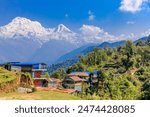 Annapurna South, Mardi Himal and Machapuchare mountain summits snow peaks in Himalayas range, Nepal. Scenic beautiful mountain landscape on the trekking path to Annapurna Basce camp hike