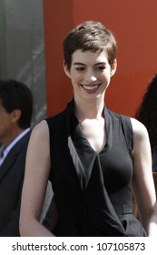 Anne Hathaway At The Christopher Nolan Hand And Footprint Ceremony, Chinese Theater, Hollywood, CA 07-07-12