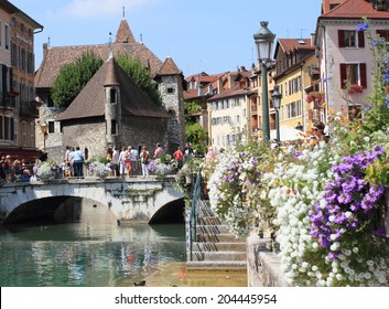 ANNECY, FRANCE- AUG 30, 2013: Annecy old town on Aug 30, 2013 in Annecy, France.  It is one of the most visited cities at the foot of Mont Blanc.