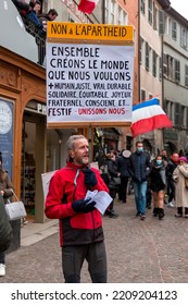 Annecy, France - January 29, 2022: Group Of People Demonstrating Against The State Oppression Of Health Pass And Vacination On The Public In Annecy Streets.