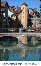 Annecy, France - July 2 2022: Canal with reflections in the old town. 