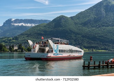 Annecy, France - May 25, 2016: Le Cygne catamaran trip boat on Annecy lake, Haute-Savoie, France.