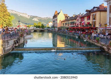 ANNECY, FRANCE - SEPTEMBER 14, 2014: Tourists in Canal du Thiou of Annecy, France.