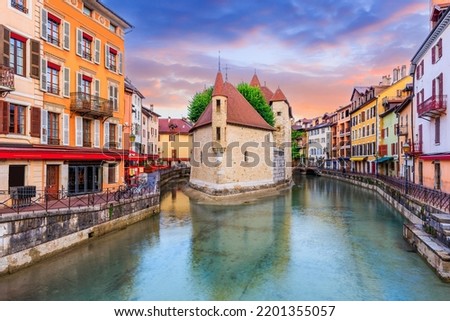 Annecy, Haute Savoie, France. The castle on an island (Palais de l'Isle) and Thiou river.