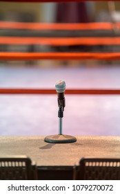 Announcer Microphone On Table Before Boxing Ring