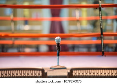 Announcer Microphone On Table Before Boxing Ring