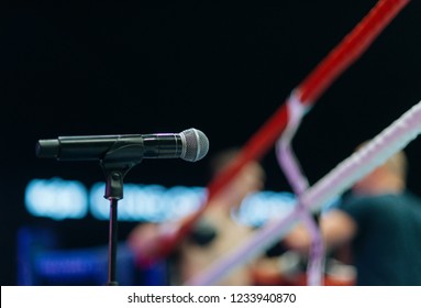 Announcer Microphone On Table Before Boxing Ring