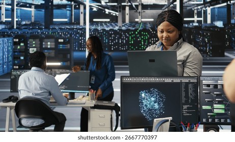 Annoyed data center admin having trouble doing node tree programming. Irked woman in server room having glitching issues while using predictive AI visualization systems on notebook, camera A
