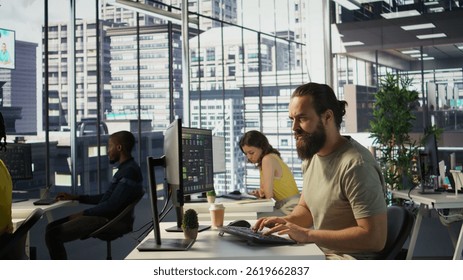 Annoyed programmer at work raging after losing all progress due to computer crash while creating machine learning models. Angry IT worker smashing desk in frustration while programming, camera B
