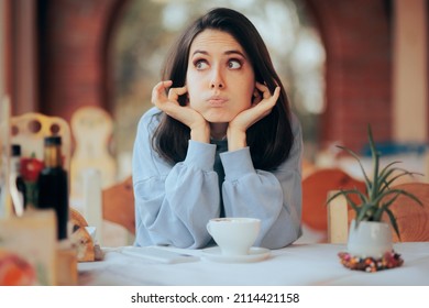 Annoyed Woman Covering Her Ears in Noisy Restaurant. Unhappy cafeteria customer complaining about the environmental noise 
