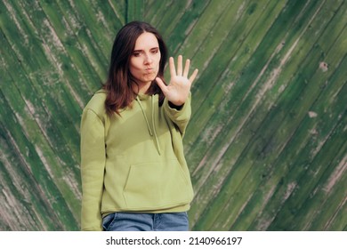 
Annoyed Woman Making Stop Hand Gesture. Angry Millennial Girl Gesturing Furiously Setting Boundaries 
