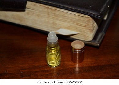 Anointing Oil Near To Holy Bible.