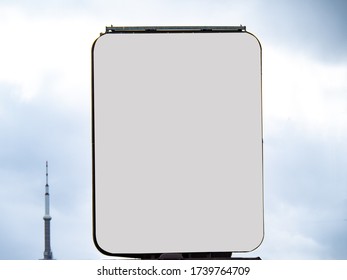 An Anonymous Blank Billboard With The Toronto CN Tower In The Distance With Copy Space