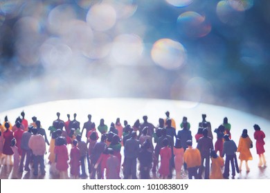 Anonymous, Blurred, Crowd Or Group Of People. A Large Group Of Generic Men And Women Following A Crowd. Faceless Workers Who Are All The Same. Group Of Folks Working Towards A Common Goal.