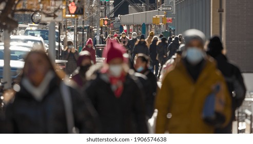 Anonymous Blurred Crowd Of People Walking Street Wearing Masks