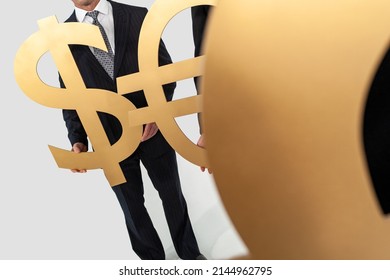 Anonymous Business People Team, Businessman And Businesswomen, Holding Large Gold Money Currency Symbols, British Pound, Dollar And Euro. Exchange Rate Or Globalisation Global Trade Concept.