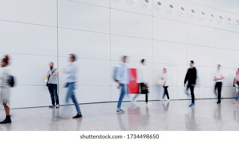 Anonymous Crowd People Is Walking In Trade Fair Or Airport In One Direction