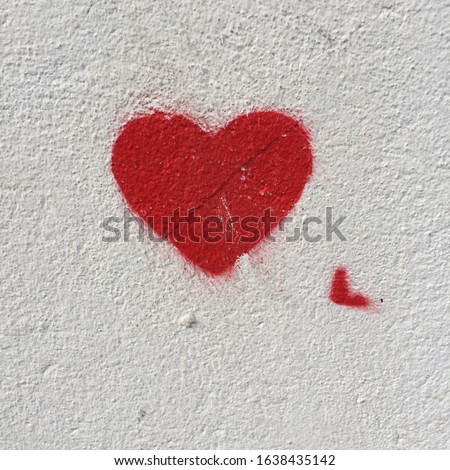 Similar – UT Only floating is more beautiful I Painted heart on the house wall