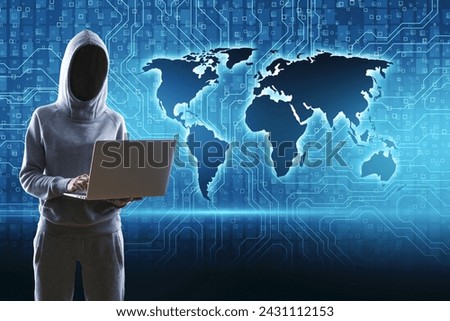 An anonymous figure in a hood, typifying a hacker, using a laptop with a digital world map in the background