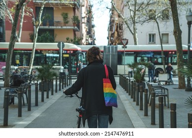 Anonymous Gay Walking With Bicycle On Street