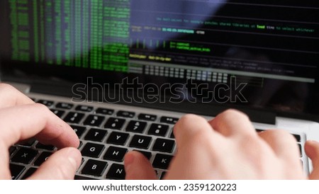 Anonymous Hacker Programming in Computer Console Breaking Password