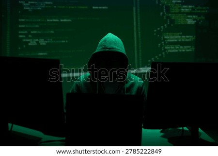 Anonymous hacker represents cyberattack risk and data breach concept.