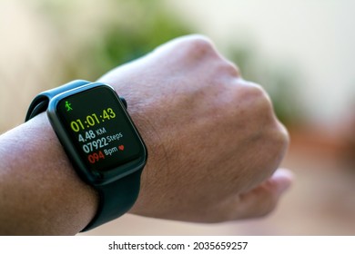 Anonymous Man Using A Digital Smartwatch During Workout.
Closeup View Of Man's Hands Checking An App In Smartwatch. Close-up Of A Clock That Shows Steps, Kilometers And bpm. - Shutterstock ID 2035659257