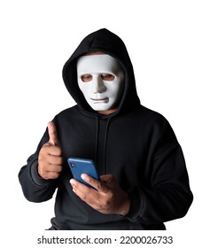 Anonymous Masked Hacker Is Using Smartphones To Penetrate Financial Data With Clipping Path, Hacking And Malware Concept.