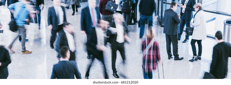 Anonymous people commuting traveling walking - Shutterstock ID 681212020
