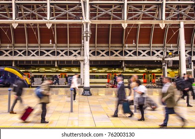 Anonymous People On A Busy Train Station Platform 