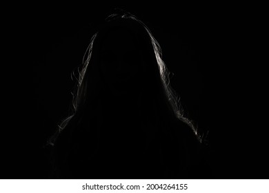 Anonymous Woman Hiding Face And Identy In The Dark Shadow