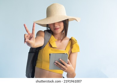 Anonymous Woman Traveler Holding Computer Tablet, Pointing Up Two Fingers, Number 2, V For Victory Hand Gesture