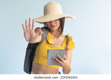 Anonymous Woman Traveler Holding Computer Tablet, Pointing Up Five Fingers, Number 5, Fifth Point Or Five Points Hand Gesture