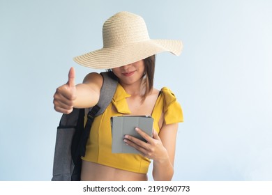 Anonymous Woman Traveler Using Tablet Computer Giving Thumb Up, Concept Image For Fast Internet Connection, New Cool App, Good Transaction Deal