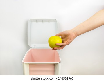 Anorexic Woman Throwing Food At Garbage