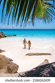 Anse Georgette Praslin Seychelles, a young couple of men and women on a tropical beach during a luxury vacation in Seychelles. Tropical beach Anse Georgette Praslin Seychelles. - Shutterstock ID 2184262439