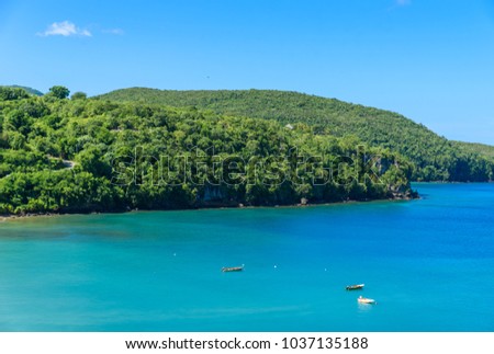 Anse la Raye - tropical beach on the Caribbean island of St. Lucia. It is a paradise destination with a white sand beach and turquoiuse sea.