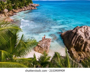 Anse Patates beach, La Digue Island, Seyshelles, Drone aerial view of La Digue Seychelles bird eye view.of tropical Island. mature couple men and women on vacation in Seychelles - Shutterstock ID 2153909909